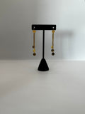 Golden Triple Cascade circle Earrings
Trinity Ball Chain Drop Earrings