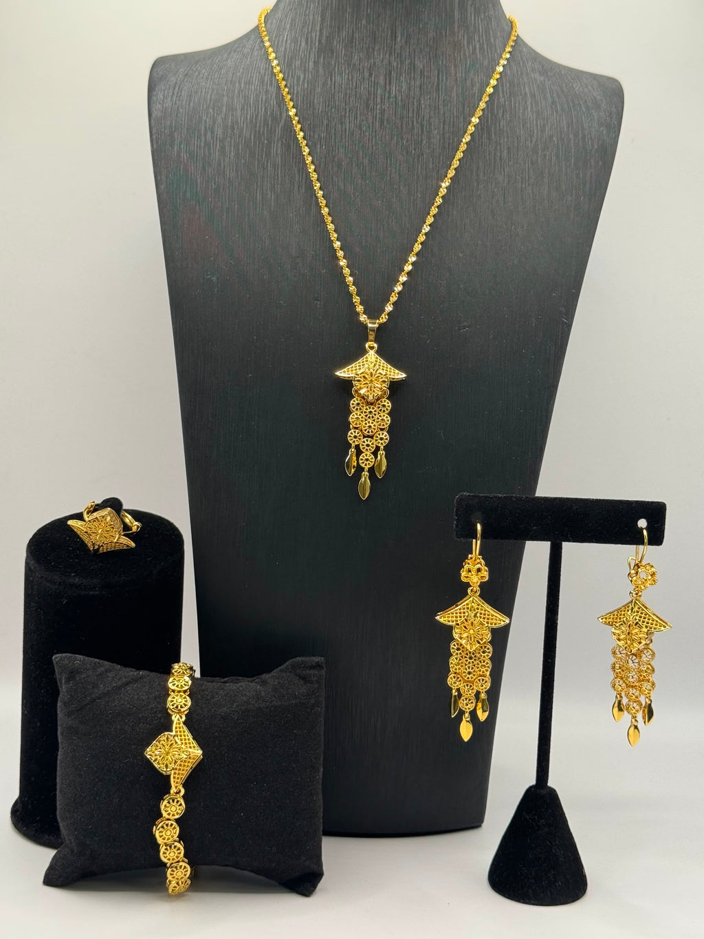 Intricate filigree and floral-inspired detailing
