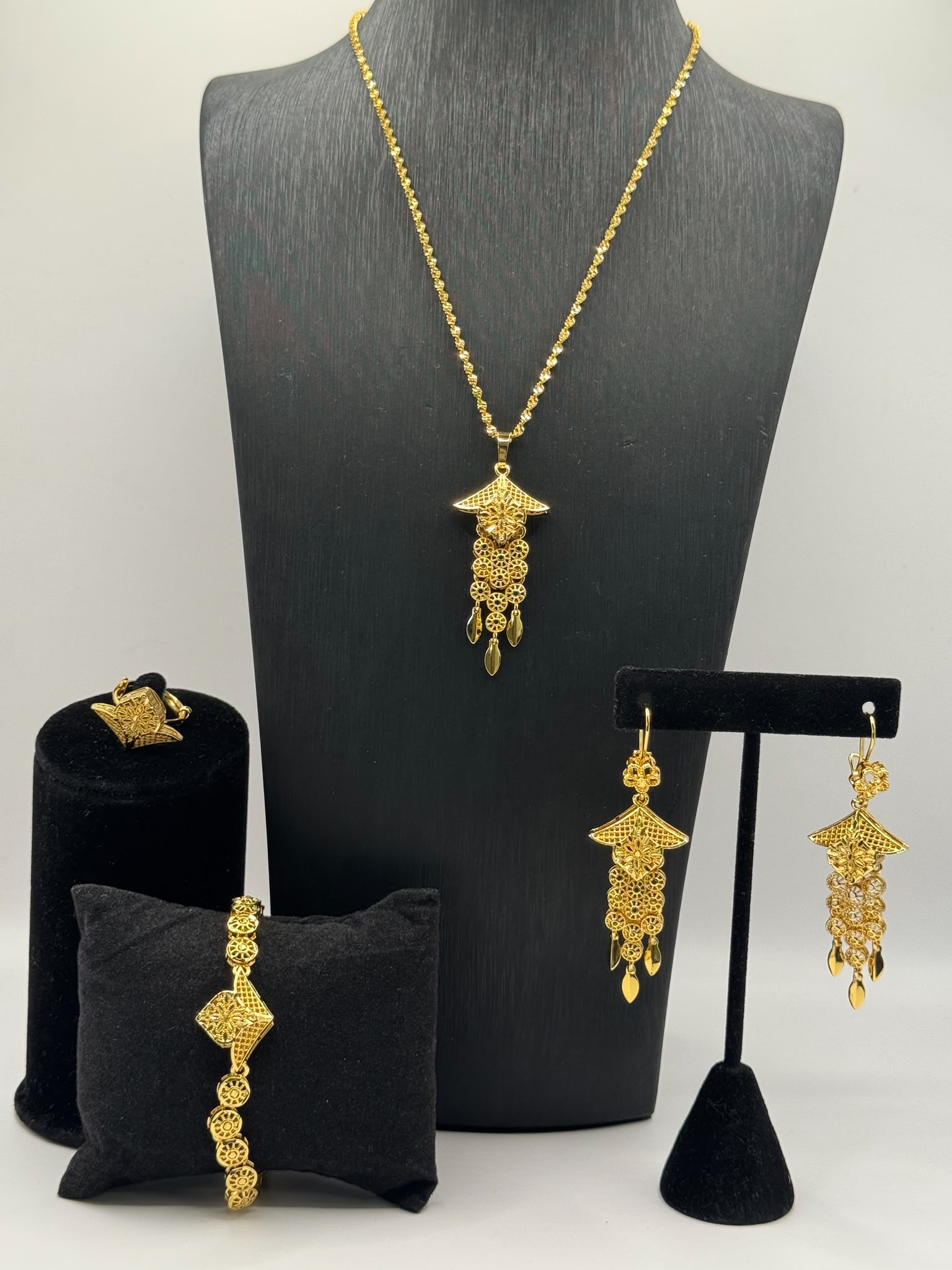 Intricate filigree and floral-inspired detailing